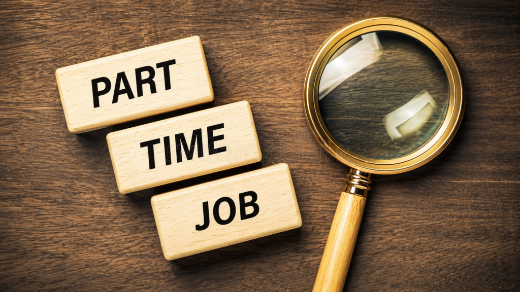 Professional part-time work from home jobs concept featuring a magnifying glass highlighting “Part Time Job” blocks on a wooden desk.