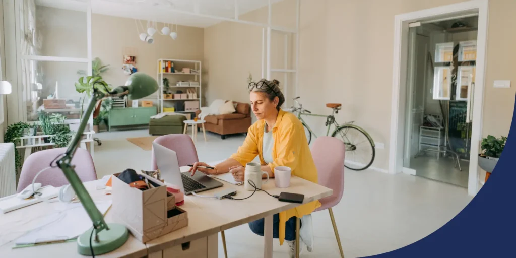 Alt text: Person working from a modern home office on a laptop, representing a successful home-based business in the United States in 2026