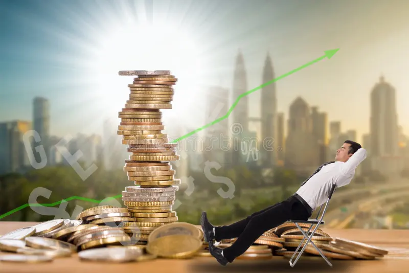 Businessman relaxing beside a stack of coins with an upward growth chart, illustrating passive income, wealth building, and long-term investment success.